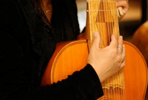Man holding string instrument