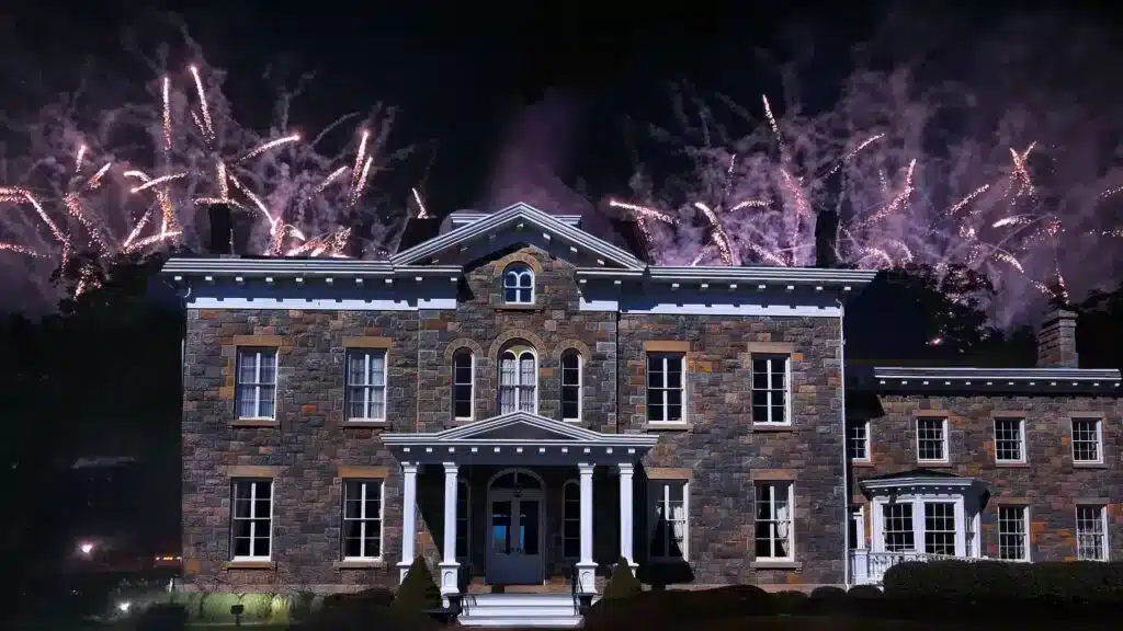 fireworks behind a house