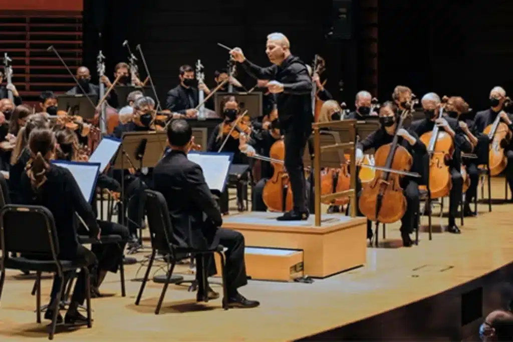 a man conducting an orchestra
